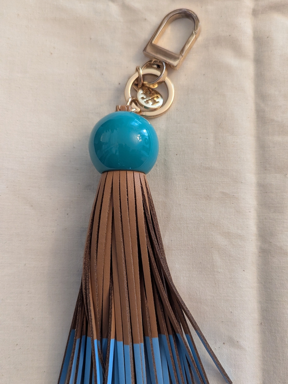 Tory Burch assel Keychain Bag Charm with TealGreen Bead and Brown Leather Fringe
